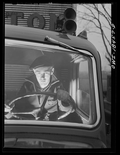 Untitled photo, possibly related to: Baltimore, Maryland. Associated Transport Company trucking terminal. "Yard jockeys" or "spotters" drive trucks around the terminal and back them up to the loading platform