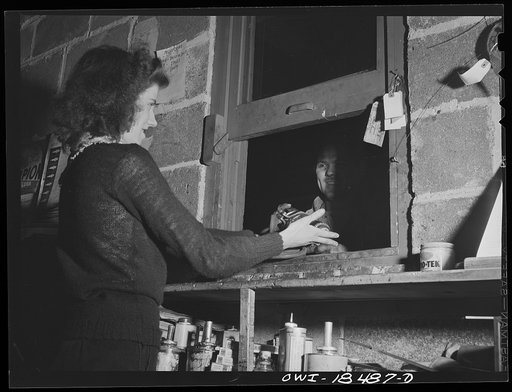 Untitled photo, possibly related to: Baltimore, Maryland. Davidson Transfer Company trucking terminal. Women work in the parts department at the truck service shop