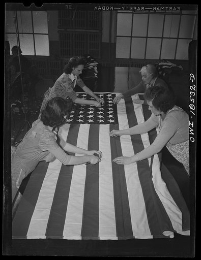 Verona, New Jersey. Women trimming threads from a flag made for the government at the Annin Flag Company