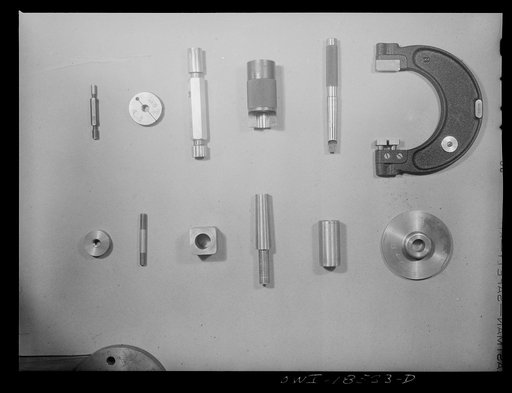 Untitled photo, possibly related to: New York, New York. Precision instruments and parts used in the classes in industrial training for war work offered to women by the New York University under United States government sponsorship