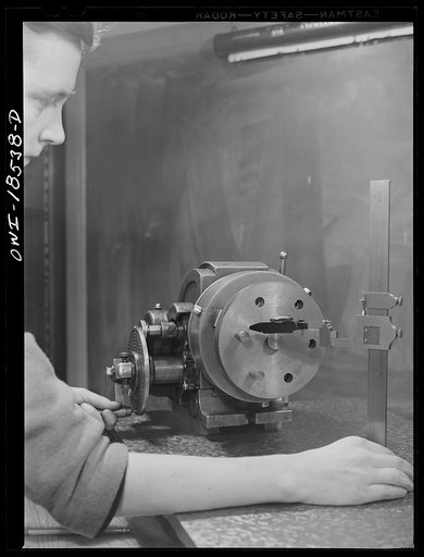 Untitled photo, possibly related to: New York, New York. Class in the use of precision instruments, part of the government-sponsored industrial training program at New York University. Most of the students are women