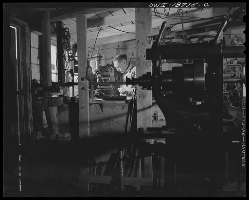 Moreno Valley, Colfax County, New Mexico. George Turner, a gunsmith as well as a cattleman, working in his shop