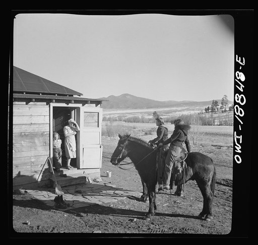 Moreno Valley, Colfax County, New Mexico. George Mutz's daughters calling on a nearby ranch