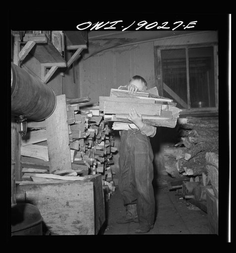 Moreno Valley, Colfax County, New Mexico. William Heck's son doing his ranch chores