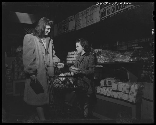 Untitled photo, possibly related to: Taos, New Mexico. First week of wartime food rationing
