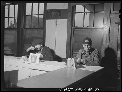 Fort Madison, Iowa. Atchison, Topeka and Santa Fe Railroad men getting a bite to eat in the reading room