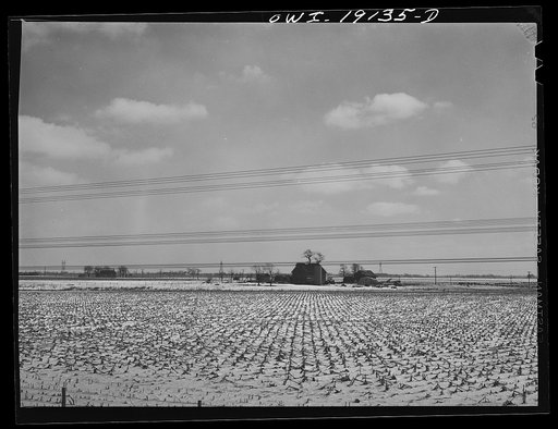 Illinois farm landscape along the tracks of the Atchison, Topeka and Santa Fe Railroad enroute to Chillicothe, Illinois
