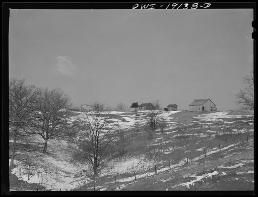 Farm landscape along the tracks of the Atchison, Topeka and Santa Fe Railroad north of Marceline, Missouri