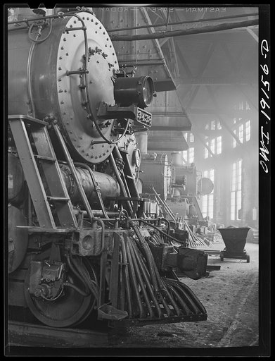 Shopton, near Fort Madison, Iowa. Engines in the Atchison, Topeka and Santa Fe Railway roundhouse. Note train control mechanism on truck wheel of the engine in foreground
