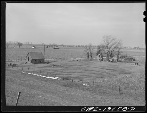 Farm landscape along the Atchison, Topeka and Santa Fe Railroad tracks near Carrollton, Missouri