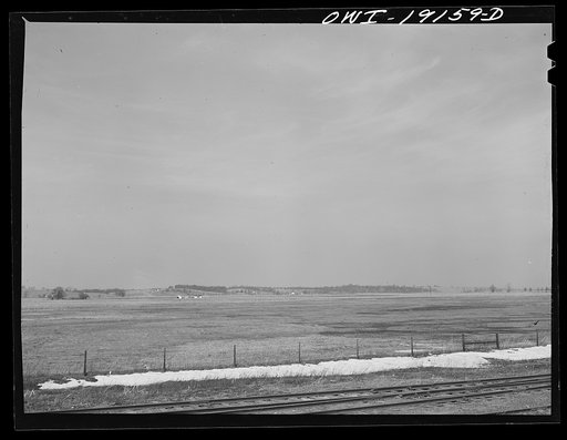 Farm landscape along the Atchison, Topeka and Santa Fe Railroad tracks near Carrollton, Missouri