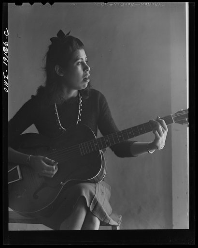 Albuquerque, New Mexico. Spanish-American girl singing folk songs