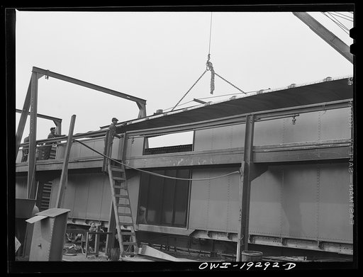 Untitled photo, possibly related to: Topeka, Kansas. General view of part of the Atchison, Topeka and Santa Fe Railroad car building shops