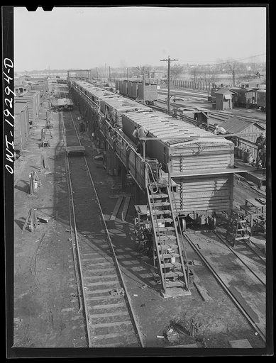 Untitled photo, possibly related to: Topeka, Kansas. General view of part of the Atchison, Topeka and Santa Fe Railroad car building shops