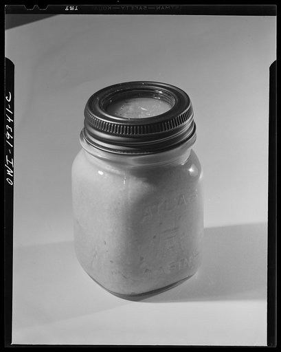Steel-saving glass-top jars recommended by the War Production Board, Containers Division, for home canning of the Victory garden fruits and vegetables in 1943. Let the jar stand for twelve hours by which time it will have cooled thoroughly. After this the screw bands may be removed permanently since