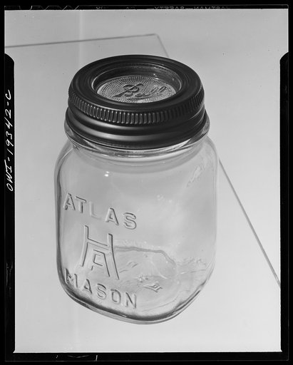 Steel-saving glass-top jars recommended by the War Production Board, Containers Division, for home canning of the Victory garden fruits and vegetables in 1943