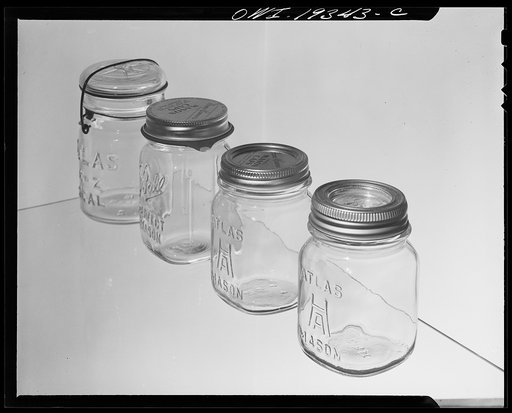 Steel-saving glass-top jars recommended by the War Production Board, Containers Division, for home canning of the Victory garden fruits and vegetables in 1943