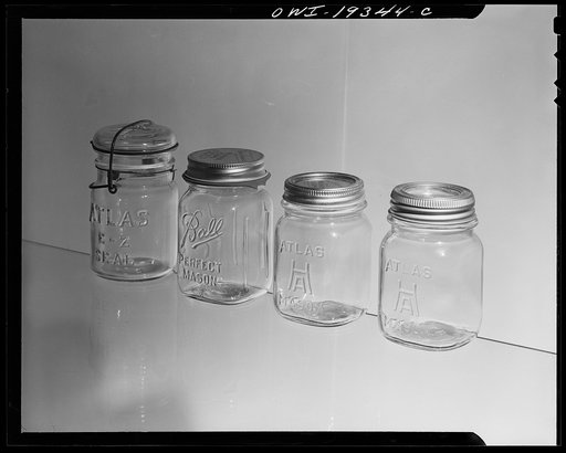 Steel-saving glass-top jars recommended by the War Production Board, Containers Division, for home canning of the Victory garden fruits and vegetables in 1943