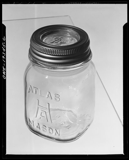 Steel-saving glass-top jars recommended by the War Production Board, Containers Division, for home canning of the Victory garden fruits and vegetables in 1943