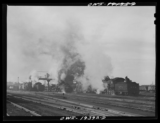 At the coal and water station of a railroad yard on the route of the Atchison, Topeka and Santa Fe Railroad