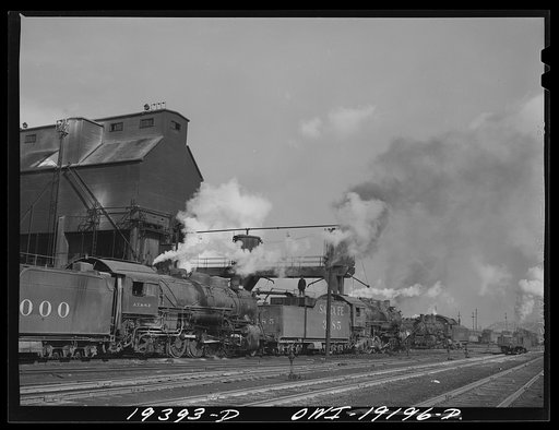 At the coal and water station of a railroad yard on the route of the Atchison, Topeka and Santa Fe Railroad