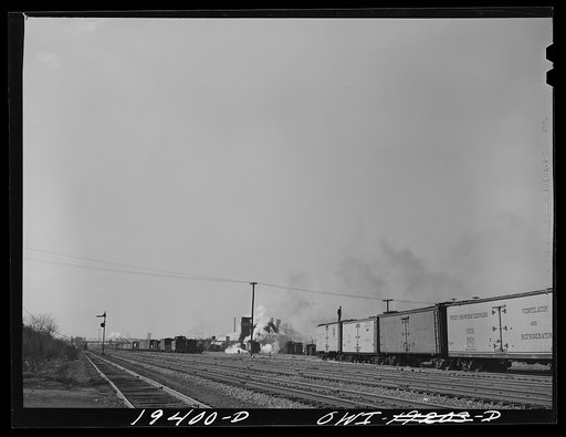 Untitled photo, possibly related to: An Atchison, Topeka and Santa Fe Railway train carrying stock cars leaving for the east
