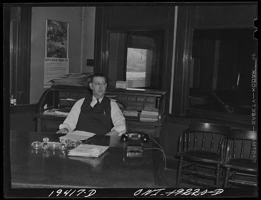 Kansas City, Missouri. R. G. Gross of the Atchison, Topeka and Santa Fe Railway, freight agent, in his office at the freight depot