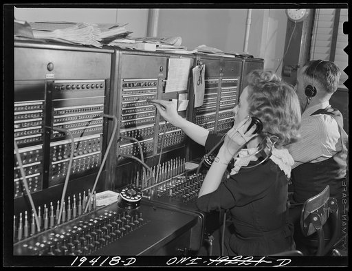 Kansas City, Missouri. Private branch exchange (PBX) operator at her switchboard in the freight depot