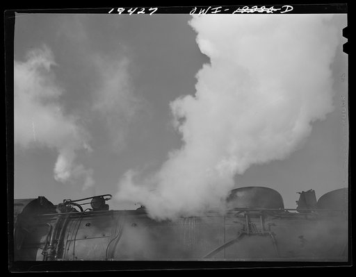 Untitled photo, possibly related to: Chicago, Illinois. Engineer gives whistle blasts to indicate Atchison, Topeka and Santa Fe Railway train is ready to leave the yard