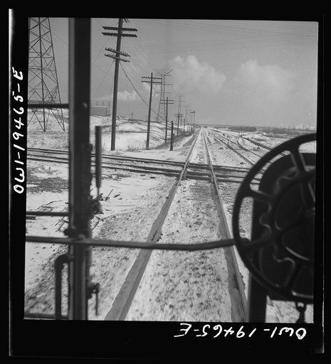 Untitled photo, possibly related to: McCook (vicinity), Illinois. Passing an eastbound passenger train along the Atchison, Topeka, and Santa Fe Railroad, between Chicago and Chillicothe, Illinois