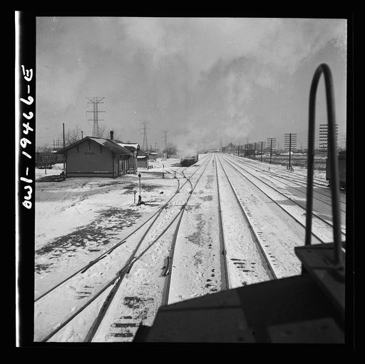 McCook, Illinois. Passing through the railroad yard on the Atchison, Topeka and Santa Fe Railroad between Chicago and Chillicothe, Illinois. This town is an important railroad suburb of Chicago