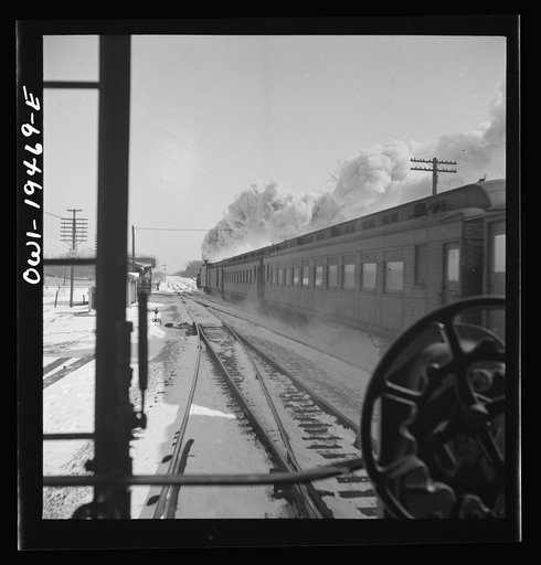 McCook (vicinity), Illinois. Passing an eastbound passenger train along the Atchison, Topeka, and Santa Fe Railroad, between Chicago and Chillicothe, Illinois