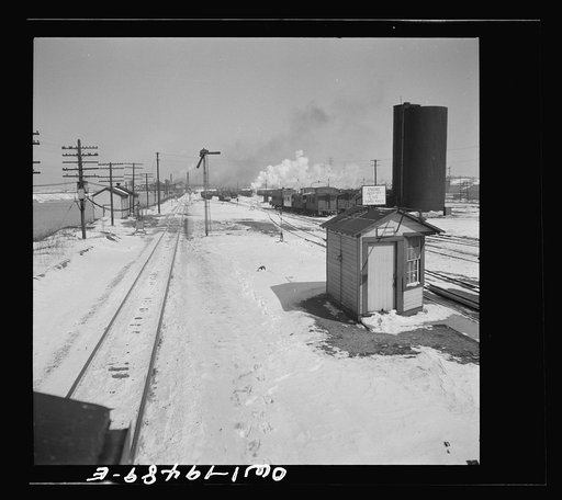 Joliet, Illinois. Leaving the Atchison, Topeka, and Santa Fe Railroad yard