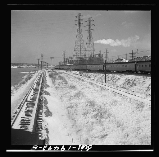 Joliet (vicinity), Illinois. Passing the eastbound streamliner "The Chief" of the Atchison, Topeka, and Santa Fe Railroad