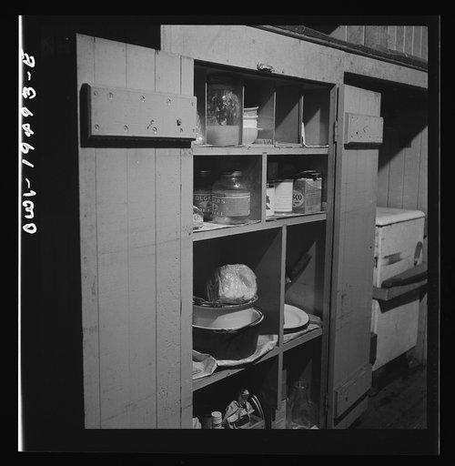 A pantry in the caboose of a train on the Atchison, Topeka, and Santa Fe Railroad between Chicago and Chillicothe, Illinois