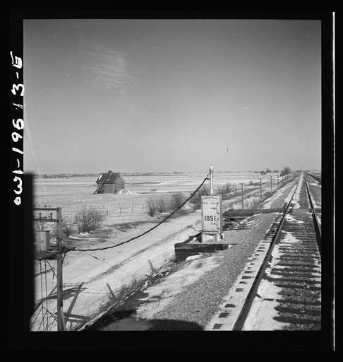 The track between Pequot, Illinois and Fort Madison, Iowa is governed by automatic train control. This is one of the relay boxes. The number "1051" stands for the first relay box in the 105th mile from Chicago
