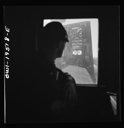 Untitled photo, possibly related to: Walter V. Dew, rear brakeman, on the Atchison, Topeka, and Santa Fe Railroad between Chicago and Chillicothe, Illinois, watching the train from the cupola
