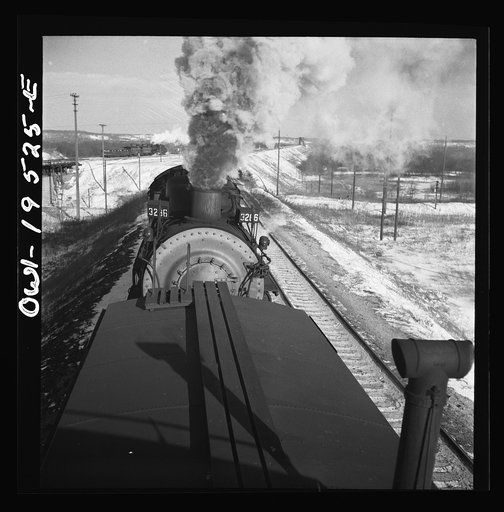 Chillicothe, Illinois. A helper engine is taken on for added power on a grade extending eight miles on the Atchison, Topeka and Santa Fe Railroad, between Chillicothe, Illinois and Fort Madison, Iowa