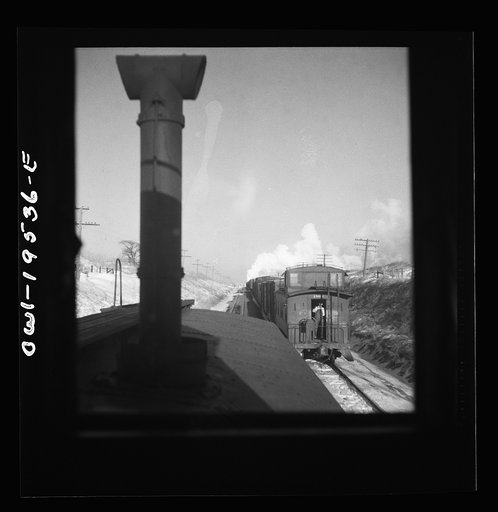 Untitled photo, possibly related to: Chillicothe (vicinity), Illinois. Leaving the helper engine behind, eight miles west of Chillicothe on the Atchison, Topeka and Santa Fe Railroad, on the way to Fort Madison, Iowa