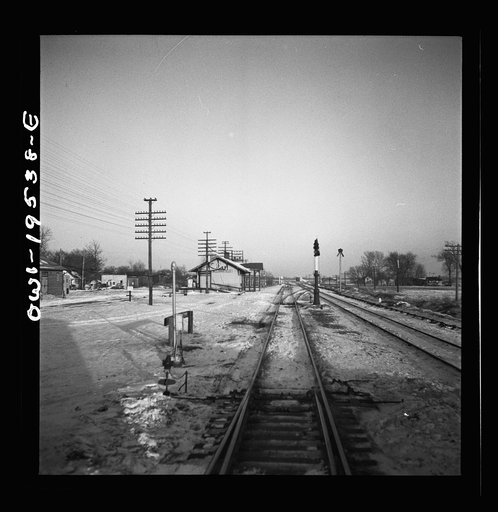 Untitled photo, possibly related to: Ransom, Illinois. Going through the town on the Atchison, Topeka and Santa Fe Railroad between Chicago and Chillicothe, Illinois