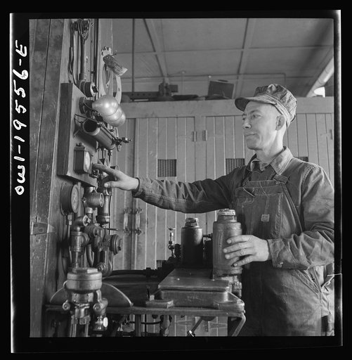 Fort Madison, Iowa. In the train control room at the Shopton shops of the Atchison, Topeka and Santa Fe Railroad. Testing pnuematic train control equipment. This rack is used for testing about eight different parts of the apparatus
