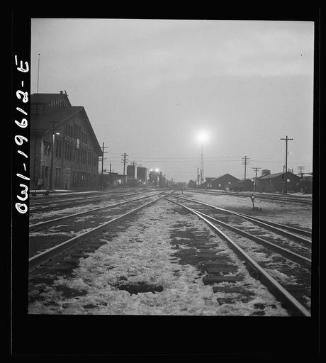 Fort Madison, Iowa. Leaving the Atchison, Topeka, and Santa Fe Railroad yard early in the morning