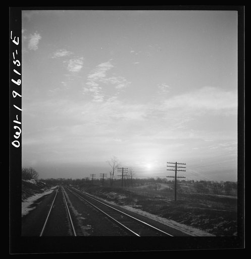 Untitled photo, possibly related to: Iowa countryside along the Atchison, Topeka, and Santa Fe Railroad yard between Fort Madison, Iowa and Marceline, Missouri