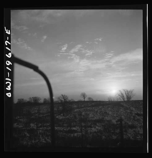 Untitled photo, possibly related to: Iowa countryside along the Atchison, Topeka, and Santa Fe Railroad yard between Fort Madison, Iowa and Marceline, Missouri