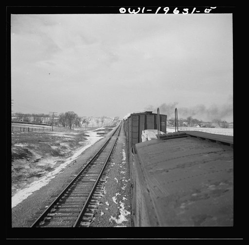Untitled photo, possibly related to: Baring, Missouri. A train stopping for coal and water along the Atchison, Topeka, and Santa Fe Railroad between Fort Madison, Iowa and Marceline, Missouri