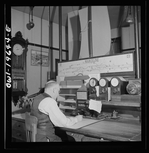 Marceline, Missouri. A dispatcher at work in the Atchison, Topeka, and Santa Fe Railroad offices