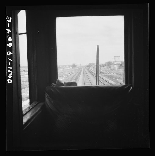 Untitled photo, possibly related to: Carrollton (vicinity), Missouri. The Atchison, Topeka, and Santa Fe Railroad tracks join those of the Wabash Railroad