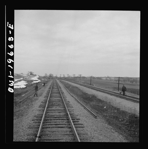 Untitled photo, possibly related to: Carrollton (vicinity), Missouri. A section gang at work along the Atchison, Topeka, and Santa Fe Railroad between Marceline, Missouri and Argentine, Kansas