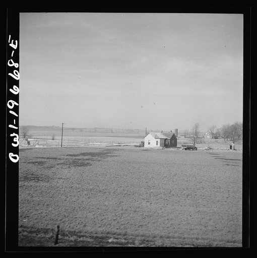 Untitled photo, possibly related to: Camden (vicinity), Missouri. A farmstead along the right of way on the Atchison, Topeka, and Santa Fe Railroad between Marceline, Missouri and Argentine, Kansas