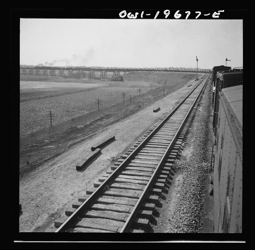 Sibley, Missouri. A freight train on the Atchison, Topeka, and Santa Fe Railroad between Marceline, Missouri and Argentine, Kansas going across the Missouri river